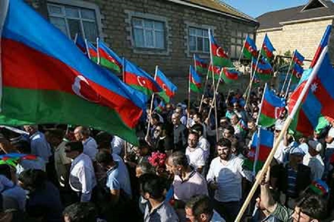 Сознательная и публичная провокация в Азербайджане. В Баку провели антироссийскую акцию протеста и «отметили» день рождения президента России