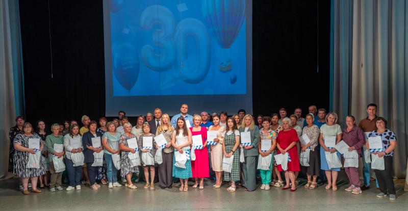 В честь Дня российской почты наградили 130 лучших почтовых сотрудников Томской области
